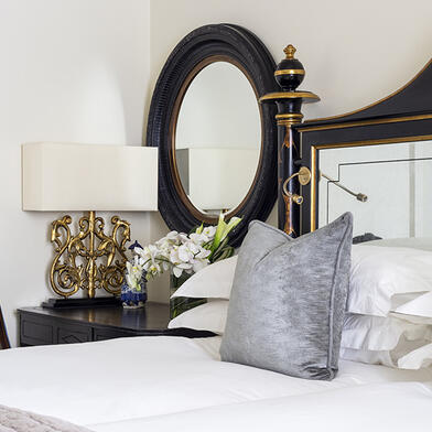 Twin Room bed with ornate mirrored headboard