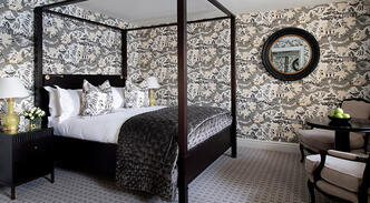 Room with four poster bed