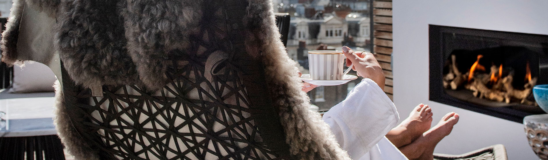 Lounging on the terrace in front of fire