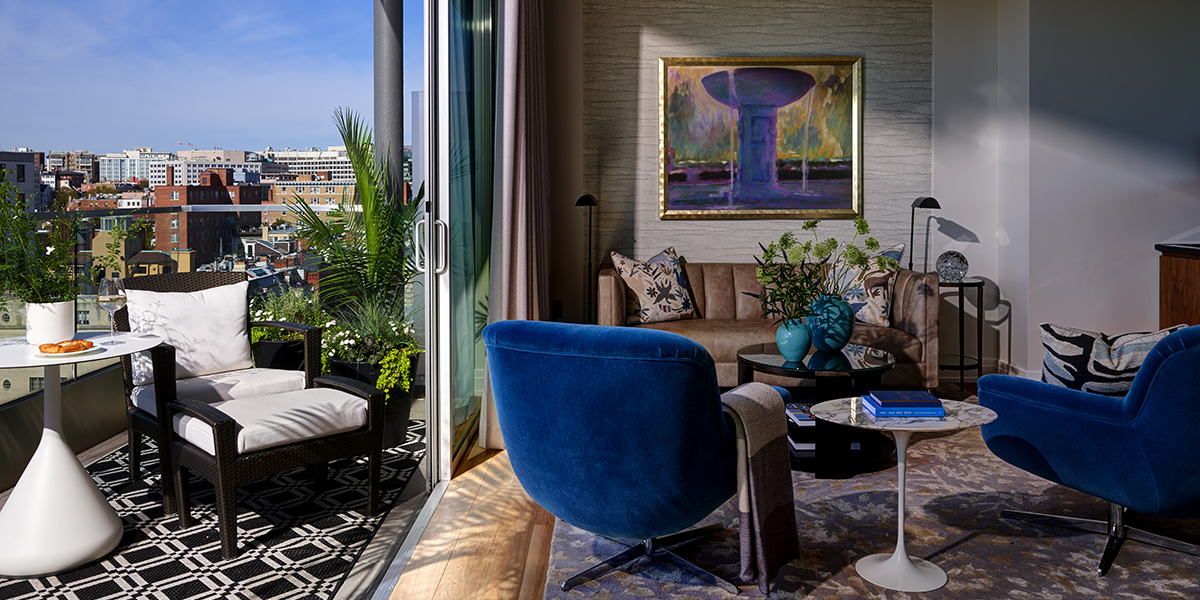 A sophisticated, residential-style lounge in The Penthouse at The Dupont Circle, highlighting elegant furniture and decor