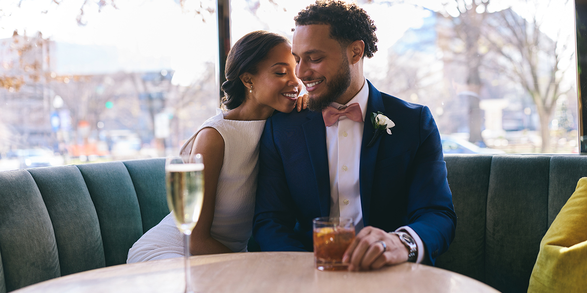 A bride and groom celebrating their wedding at The Dupont Circle, capturing a timeless romantic moment within the hotel's sophisticated Washington, D.C. event space.
