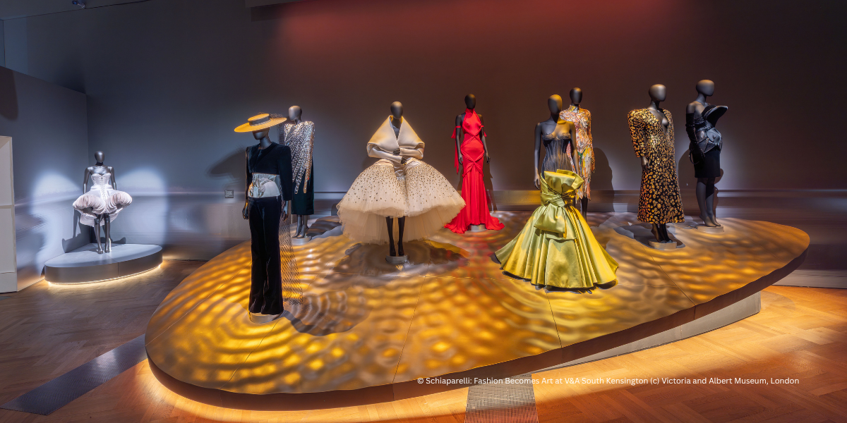 A display of avant-garde Schiaparelli couture dresses on mannequins at the Victoria and Albert Museum fashion exhibition