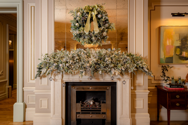 Christmas decorations adorning the fireplace at The Kensington Hotel.