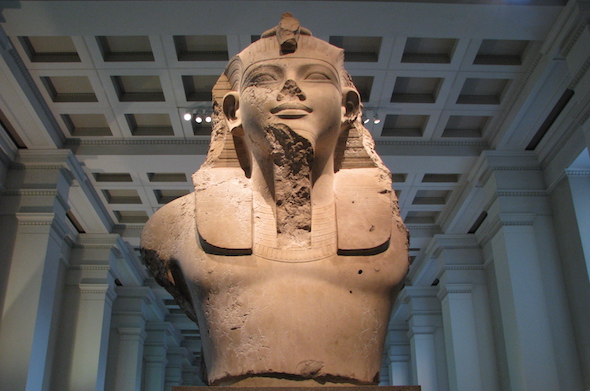 close up image landscape image of Egyptian statue of king Tutankhamen displayed at the british museum 