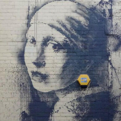 Banksy street art - woman with earring