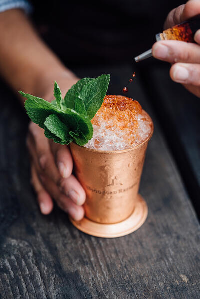 Mint Juleps are served in traditional cups
