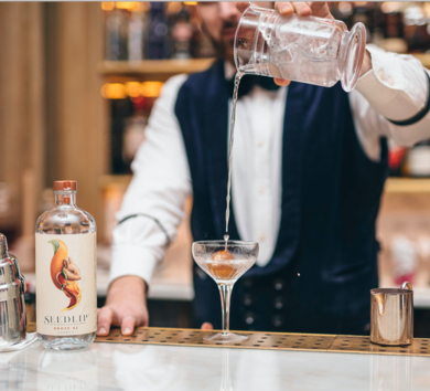 Bartender making a cocktail using Seedlip
