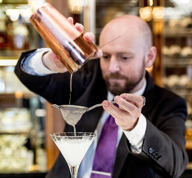 Bartender Ben Manchester making a cocktail