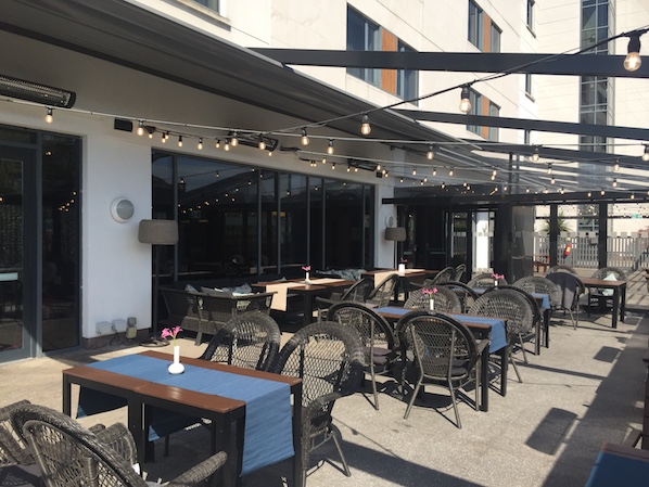 A sunny outdoor dining terrace in Dublin right by Croke Park stadium, food served all day