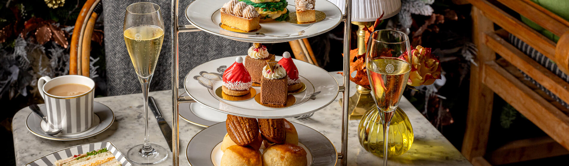 Festive Afternoon Tea served with two glasses of champagne on The Dalloway Terrace at The Bloomsbury Hotel, Central London.