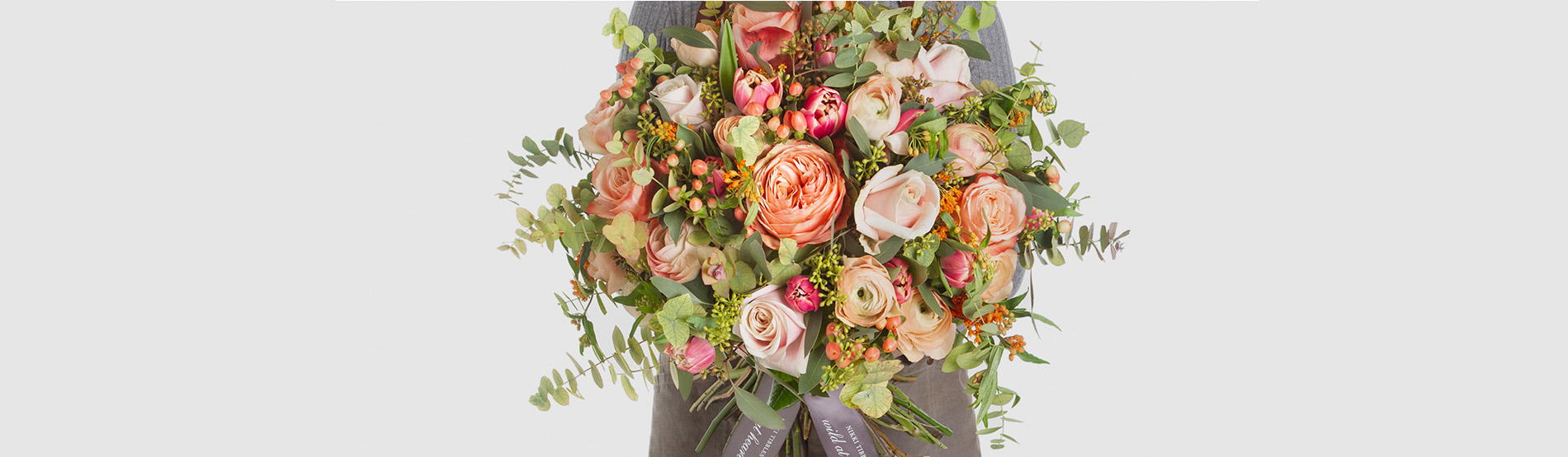 A large bouquet of white and pink flowers