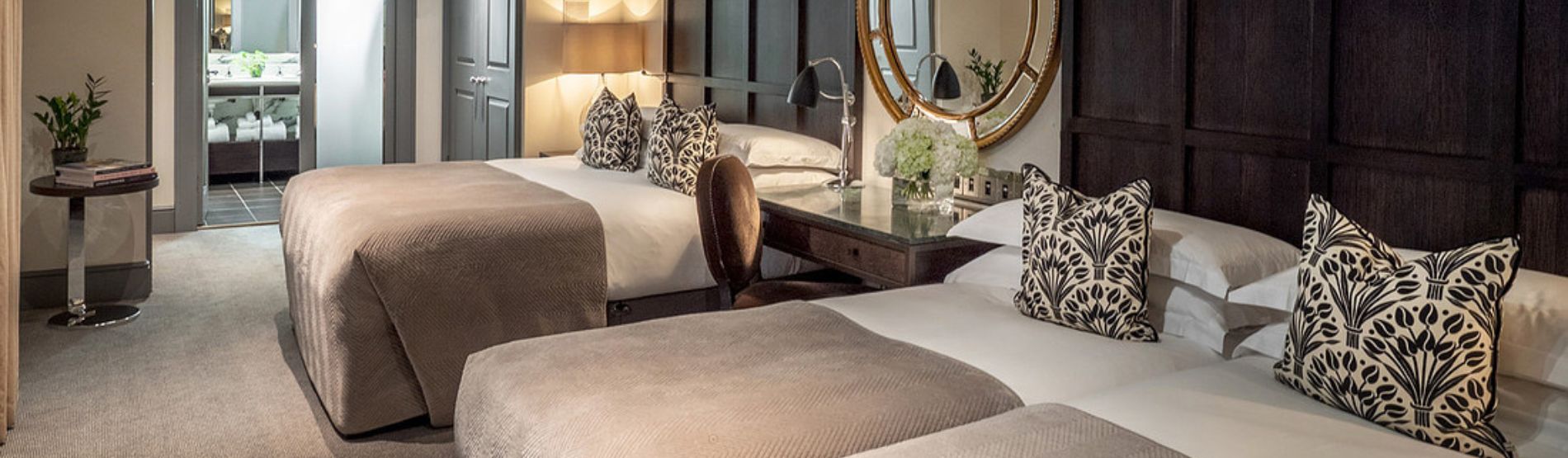 Spacious Family Suites at The Bloomsbury: Featuring one double and a king-sized beds, designed for seamless group travel and family escapes.