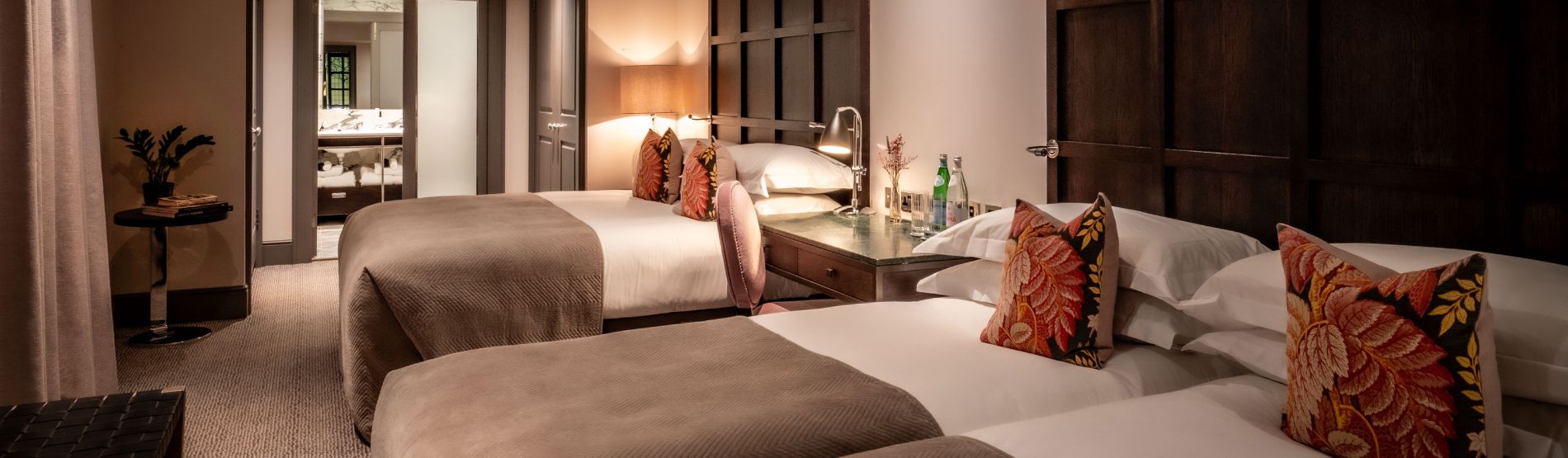 Spacious Family Suites at The Bloomsbury: Featuring one double and a king-sized beds, designed for seamless group travel and family escapes.