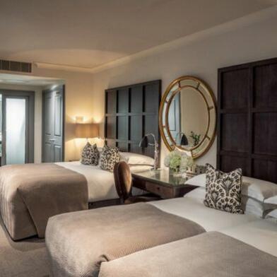 Spacious Family Suites at The Bloomsbury: Featuring one double and a king-sized beds, designed for seamless group travel and family escapes.