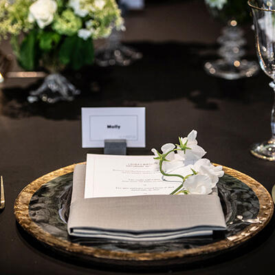Wedding place card and menu on table