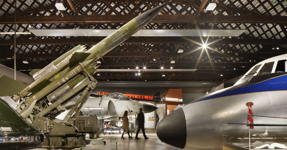 A collection of airplanes showcased in the aerospace museum