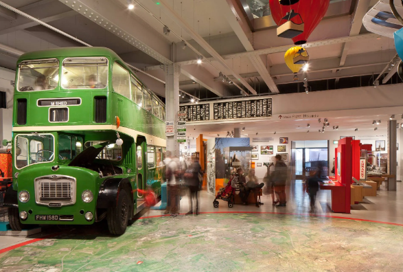 Visitors exploring the exhibits at the M Shed, a museum of Bristol's history.