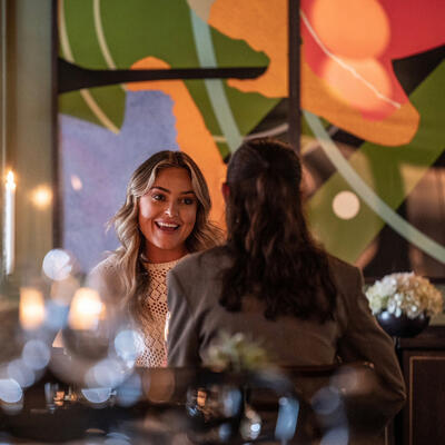 Guests enjoying the vibrant atmosphere and fine dining at The Hawthorn