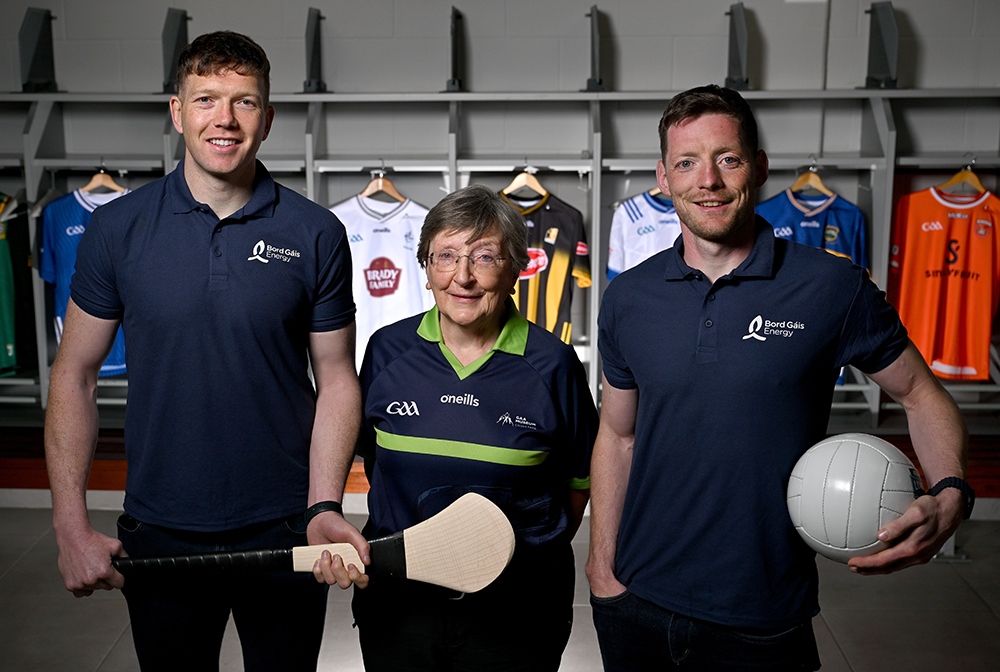 Bord Gáis Energy Legends Tour participants at Croke Park, holding a football and hurling stick