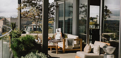 Guest relaxing on the private terrace of a luxury suite at The Dupont Hotel in Washington, D.C.