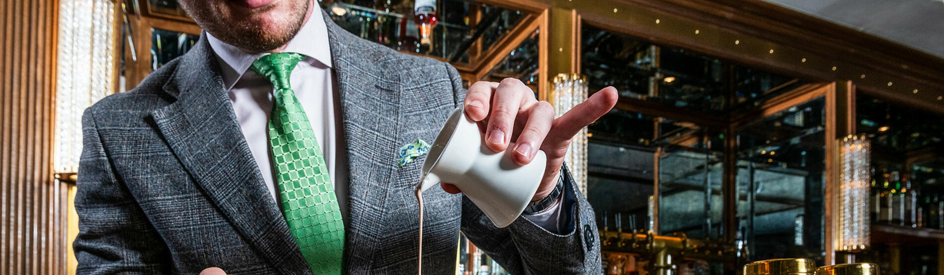 Expert mixologists at The Dupont Circle handcrafting a signature cocktail in celebration of Irish Heritage Month.