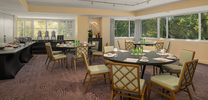 An inviting view of the Kalorama Room’s with round table configuration and a refreshing tea break station set up for interactive workshop.