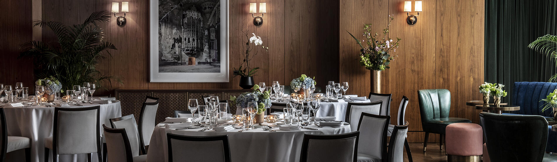 Formal round table setup for a private wedding event in the Glover Park room at The Dupont Circle Hotel.