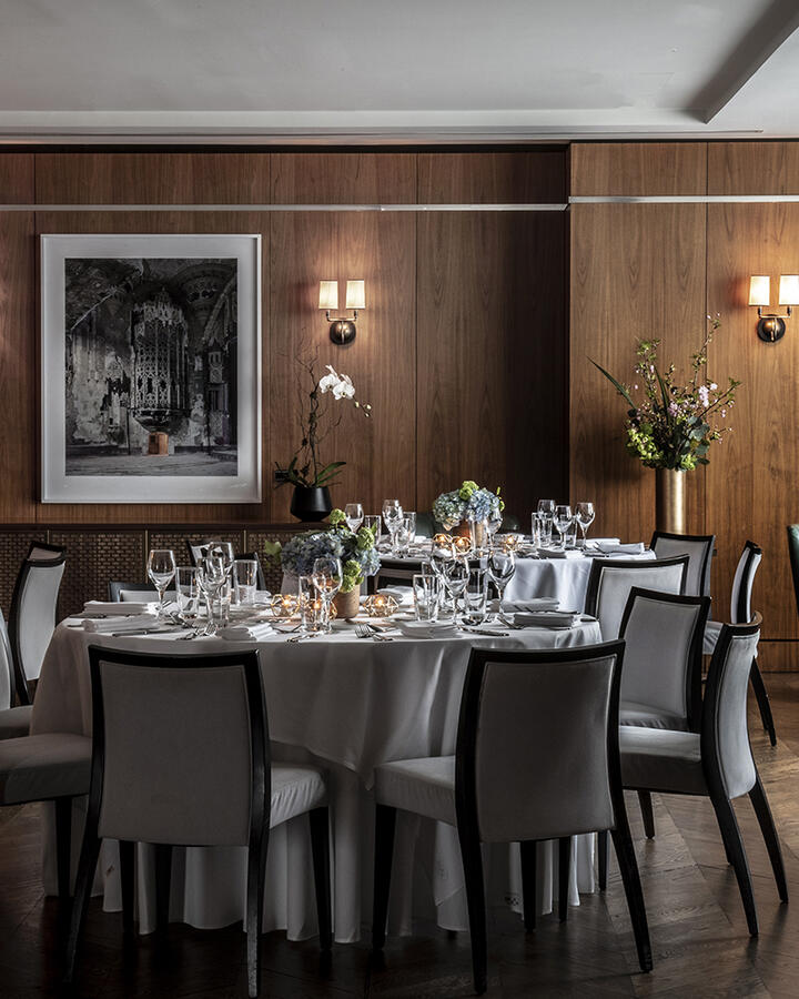 Formal round table setup for a private wedding event in the Glover Park room at The Dupont Circle Hotel.