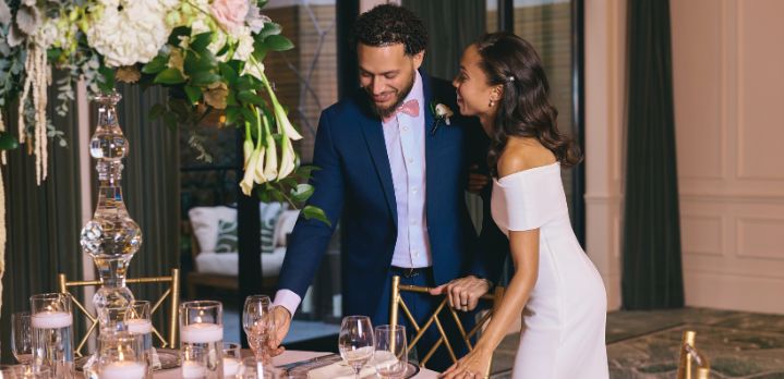 Newlyweds sharing a happy smile during their wedding reception celebration at The Dupont Circle hotel in Washington DC.