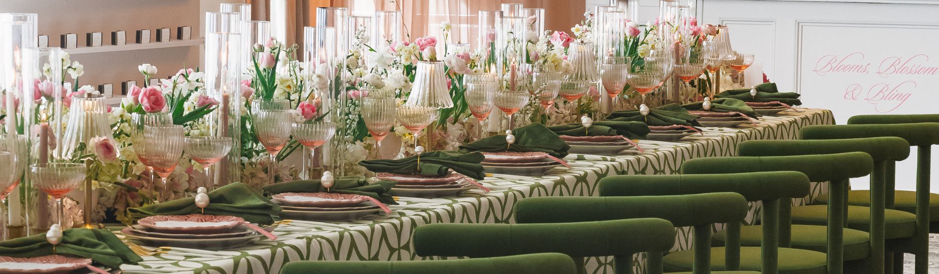 Foxhall reception setup featuring green and pink décor with elegant table settings and floral accents