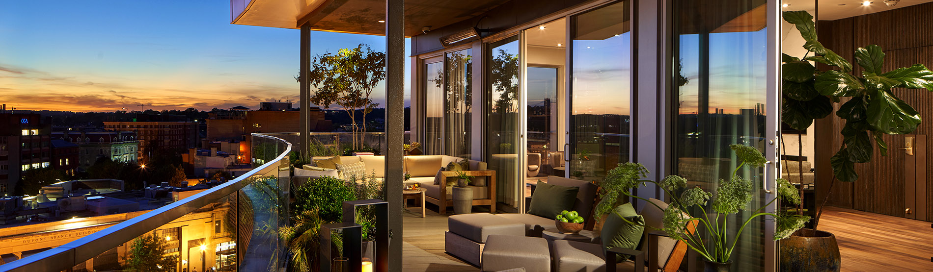 Large outdoor terrace overlooking city at dusk