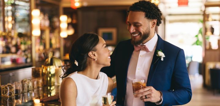 Bride and groom celebrating at The Doyle Bar, The Dupont Circle Hotel, Washington DC