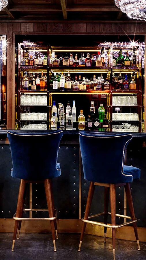 K Bar with blue velvet bar stools