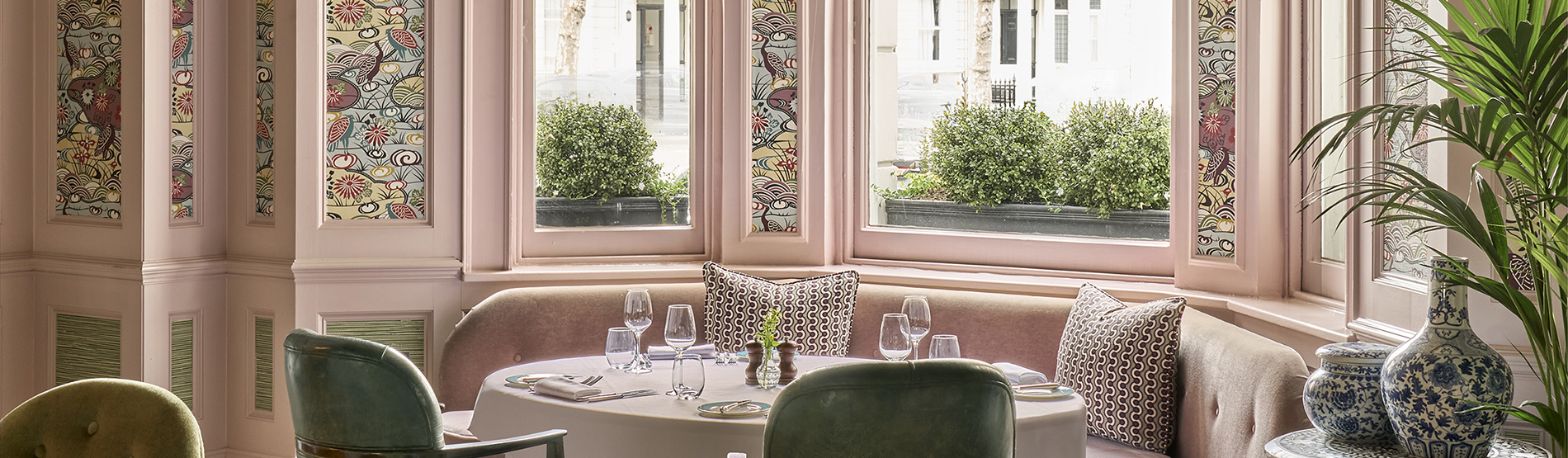 The Town House at The Kensington elegantly prepared for an intimate private dinner, featuring a perfectly set table and sophisticated decor in a classic setting.