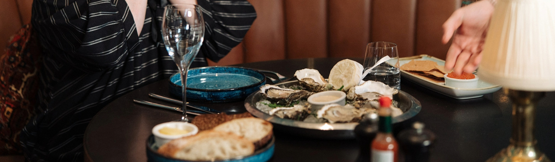 A platter of chilled local oysters with lemon and garnishes at The Grill Room, Cork