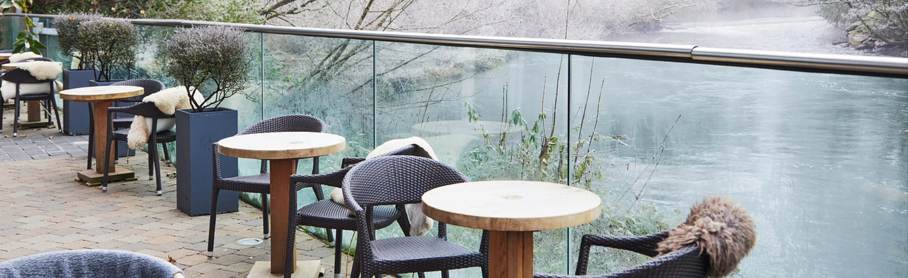 A tranquil winter scene of The River Club Terrace at The River Lee Hotel, overlooking the River Lee.