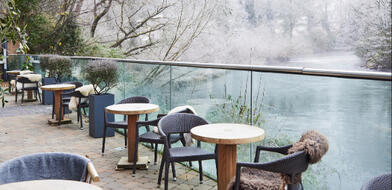 A tranquil winter scene of The River Club Terrace at The River Lee Hotel, overlooking the River Lee.