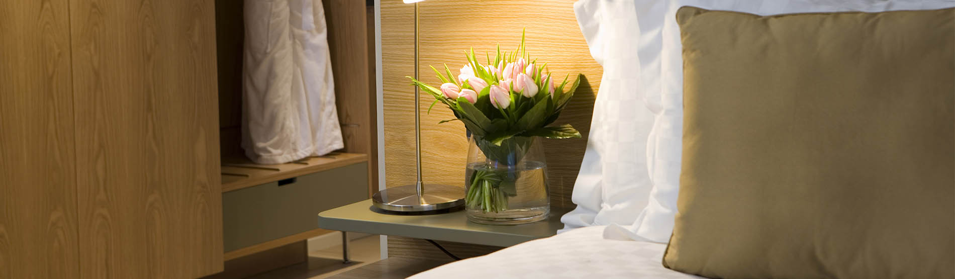 closeup of flowers beside a bed