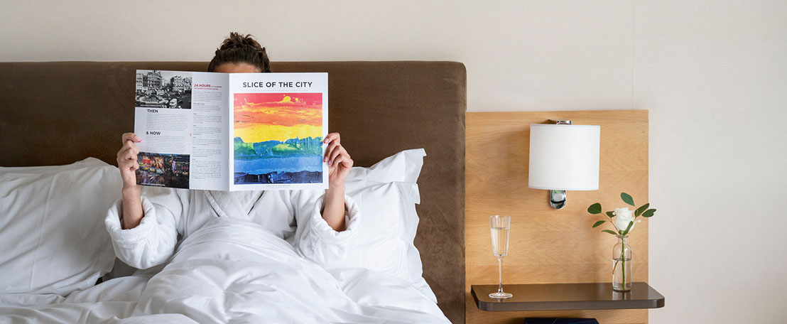 Guest reading Slice of The City magazine | Weekends in The River Lee hotel Cork