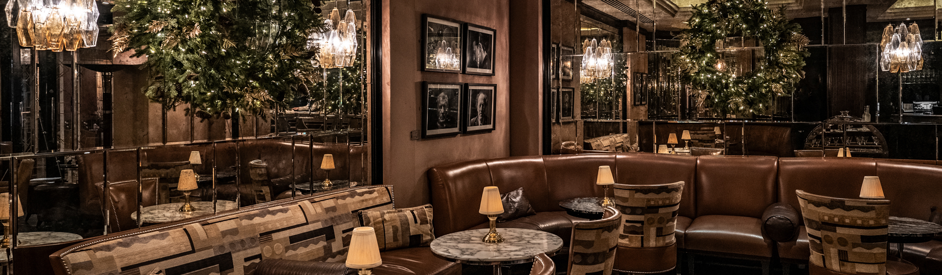 The Sidecar bar at The Westbury hotel adorned with Christmas decorations, offering a warm, intimate, and festive ambiance.