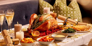 A traditional Christmas treat: The Kensington hotel, featuring a succulent turkey dinner served alongside roasted vegetables and three champagne glasses.
