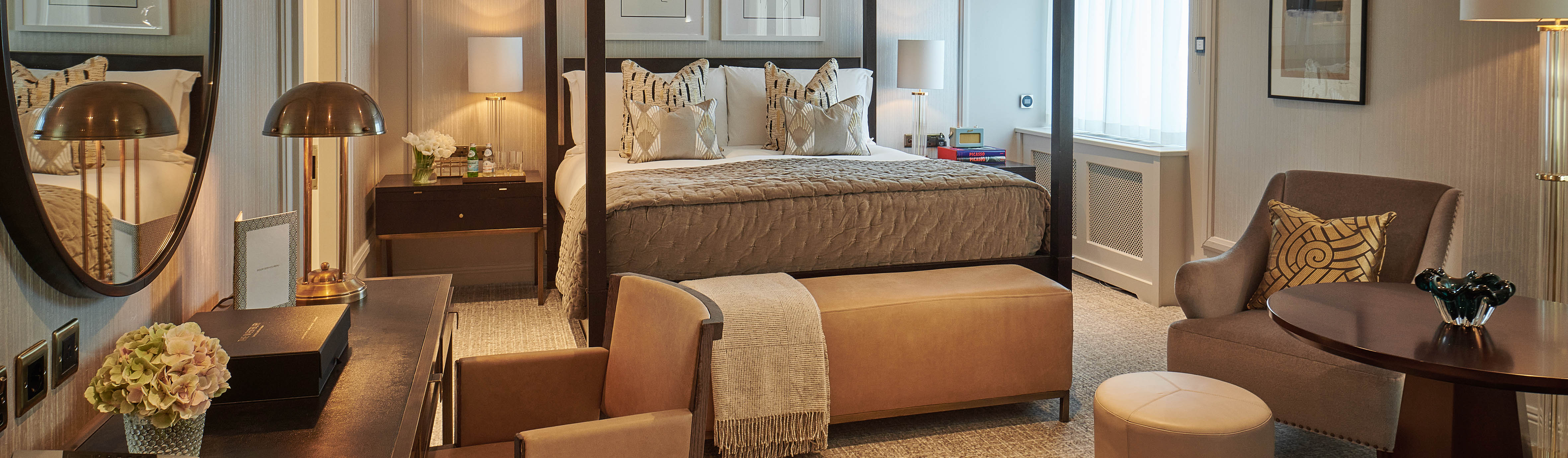 A luxury Studio Suite at The Westbury with a classic four-poster bed. This spacious room offers interconnecting options, perfect for families or groups visiting Dublin.