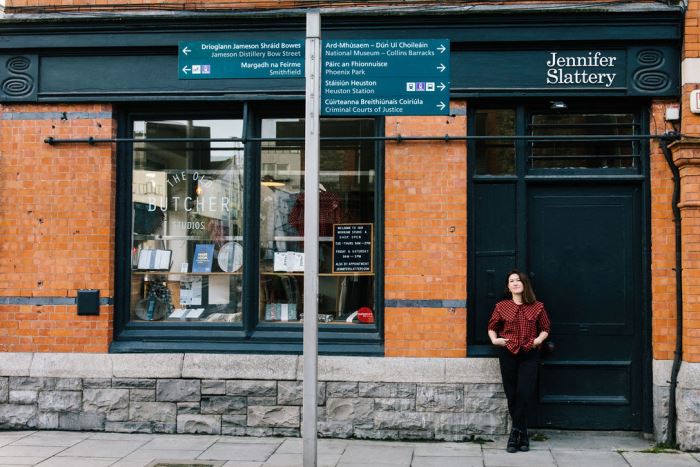 Jennifer Slattery standing in front of her shop