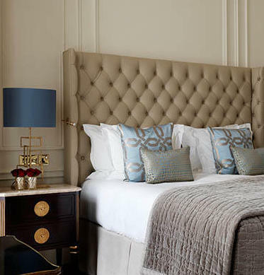 Suite bedroom at The Kensington hotel in London